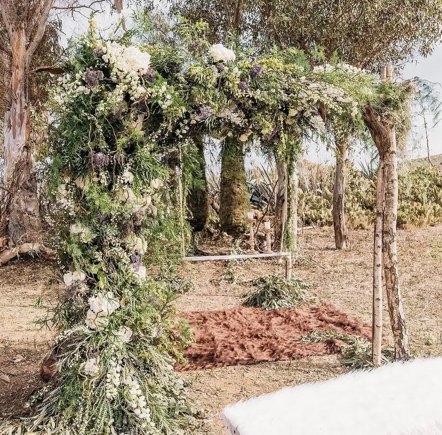 Wild floral arch for a wedding ceremony